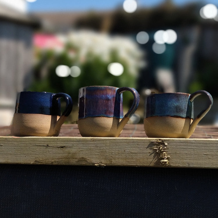 Medium and small mugs